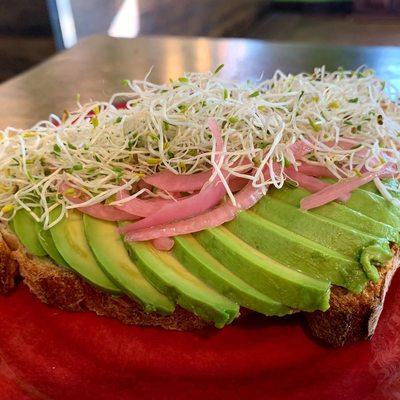 Avo toast with house pickled onions