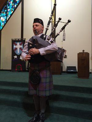 Playing bagpipes for a reformation service in Cuero, TX