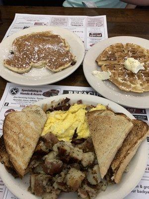 Chocolate Chip pancake, home style waffle, scrambled eggs, home fries, corned beef hash ( under the eggs) and sourdough toast.