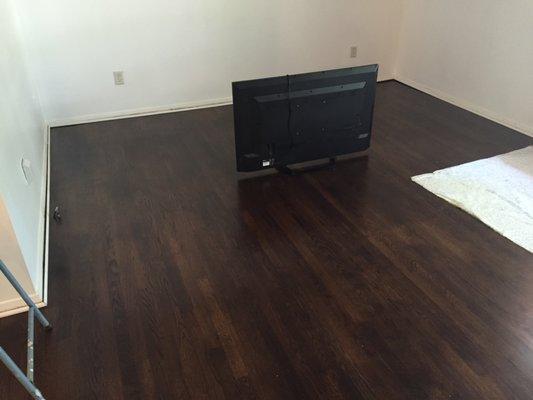 Dark is in! Home in Atlanta, 50 year old floors went from ugly natural to silky dark walnut.