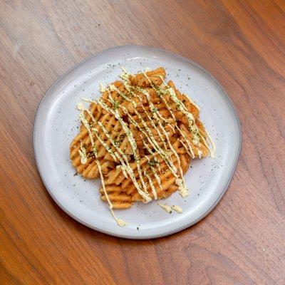 side of waffle fries topped with kewpie mayo and furikake