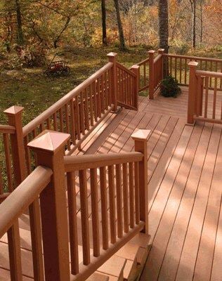 Attention to detail can turn a pretty deck into a beautiful deck.The copper post caps add a little flare.