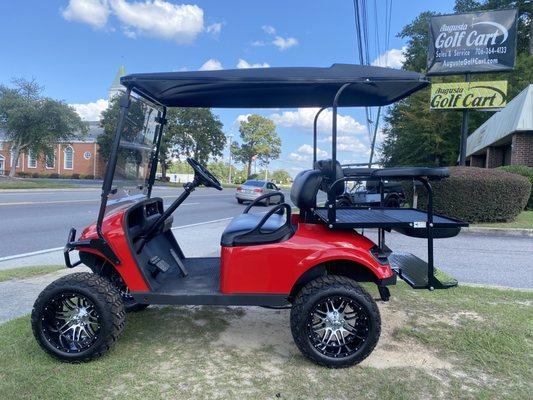 Wrap around bumpers, new seats, USB connections, turn signals, horn, custom wheels and rims.