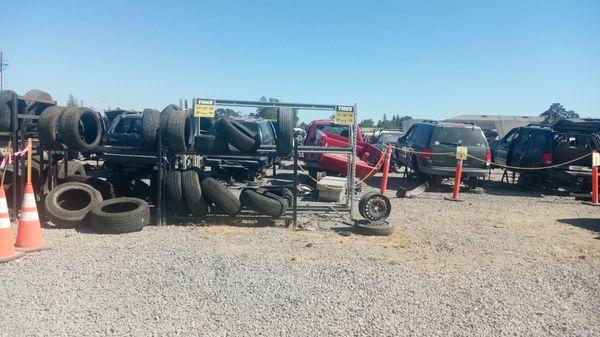 Yellow signs showing tires prices