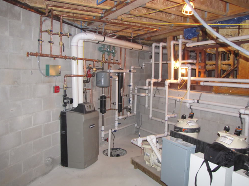 Indoor pool piping. Radiant heat, high efficiency boiler , pool pack system.