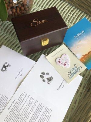 His nose and paw print, the rainbow bridge poem, the certificate and a pretty little heart.