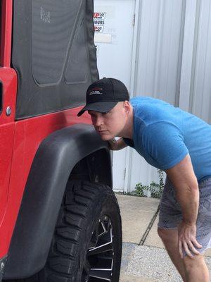 Identifying dents before starting the repair process.