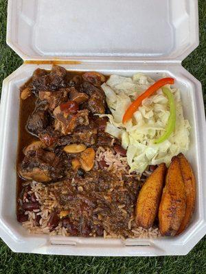 Oxtail W/ Rice&Peas Cabbage and Plantains.