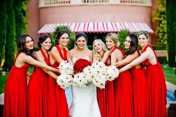 Blushing bride with her bridesmaids