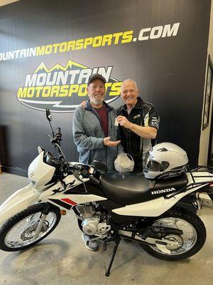 Daddy, David at Mountain Motorsports & dad's new Honda XR150!