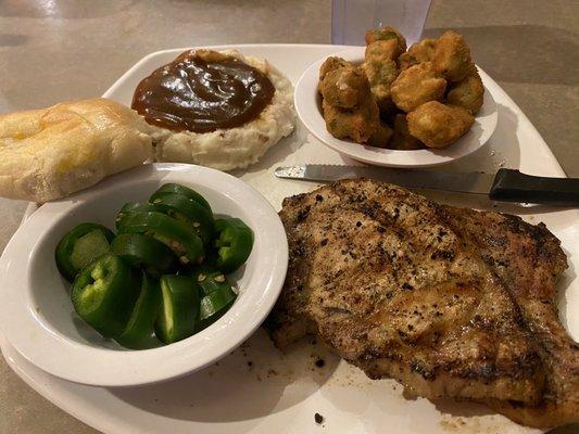 Pork chop dinner, okra, mashed potatoes with brown gravy, roll & sliced jalapeños