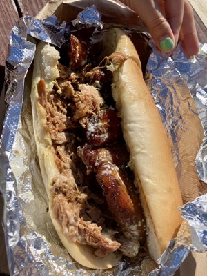 Pernil Sandwich topped with plantains. Absolutely fantastic! $10 and huge.