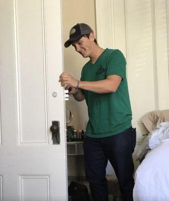 Cody replacing a jimmy proof deadbolt for a customer