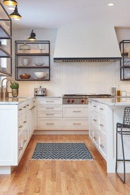 Modern white kitchen with open shelving made of steel.