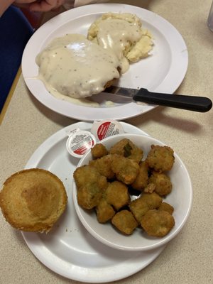 Steak cutlet, mashed potatoes and okra