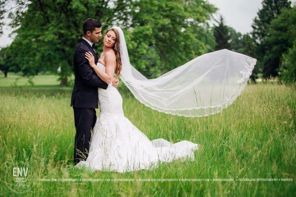 Bride and groom on the course.  Photo Credit: ENV Photography