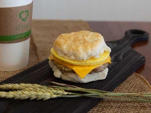 Sausage breakfast sandwich on a biscuit.