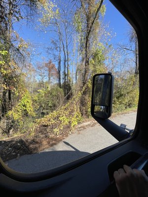 The entrance is all the way in the back near the swamp.