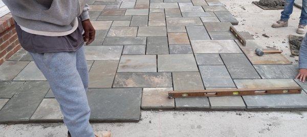 We design, and construct patios,  walkways , pools ares , using the finest materials such as bluestone,milestone, etc.