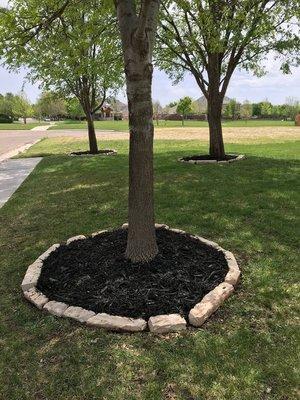 Let us freshen up your mulch to make your flower beds pop again!