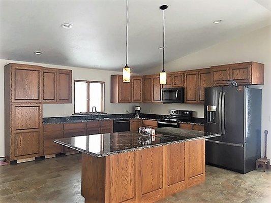 Oak cabinets in a kitchen addition at Long Lake, near St. James.