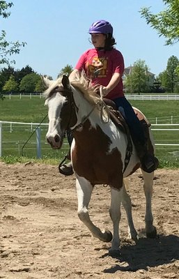 This student enjoying riding outside in the nice weather!