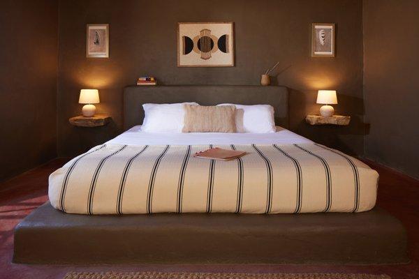 Casa Piedra bedroom with a plush king size bed.