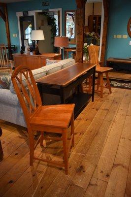 Carnegie bar stool, Waves of grain bar stool and a Walnut live edge console table