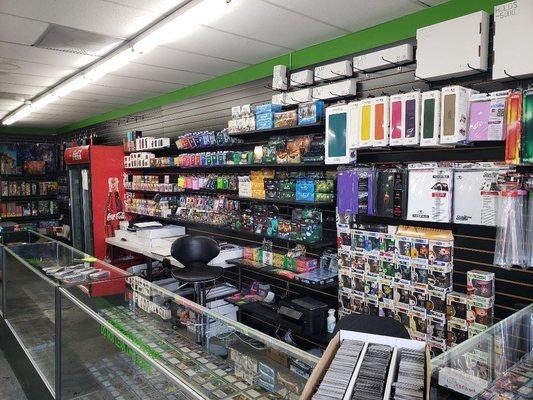 Front counter, mtg products,singles, deck boxes, 5row boxes, binders, sleeves, matt tubes