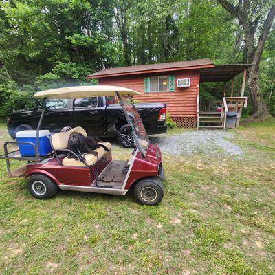 Cabin 6 is sweet, Rocky loved the owner Steve's golf cart.