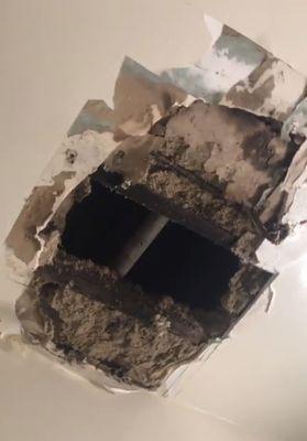 One of the times they "fixed" leaks in my ceiling. There's mold inside and they left my ceiling like that for two days. On top of toilet.