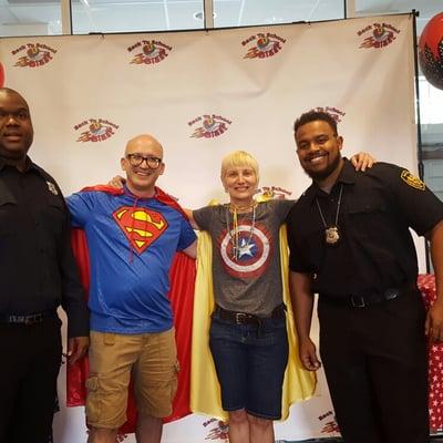 Safe Choice officer's with super hero pastors at the Back to School Blast at Garfield Memorial Church in Pepper Pike Ohio pas...