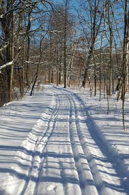 Grromed trail for cross country skiing and snowshoeing