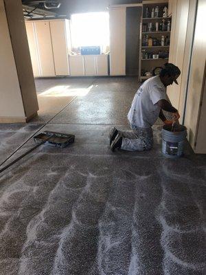 Diamond grind surface to remove dirt and open it up for optimum adhesion.