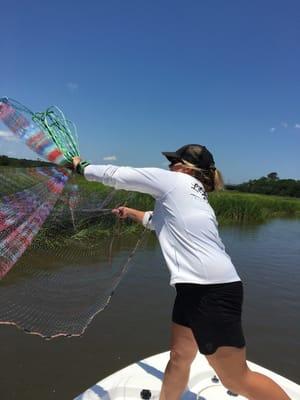 Demonstrating how to use a cast net