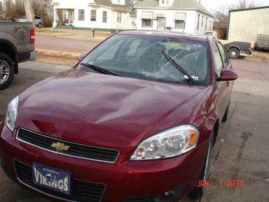 Hood, roof and windshield damage to Impala