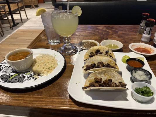 Carne asada street tacos, cilantro lime rice and ranch beans.