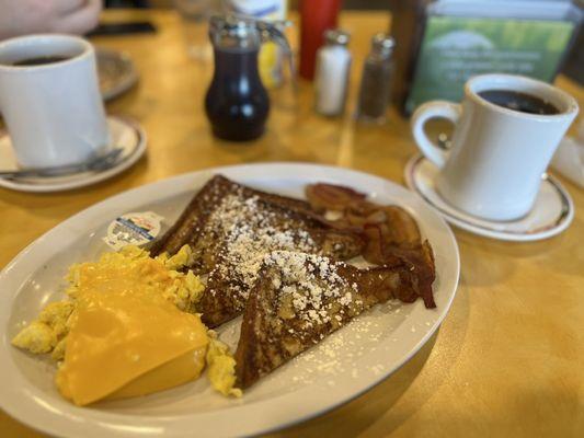 French Toast platter with scrambled eggs with cheese and bacon