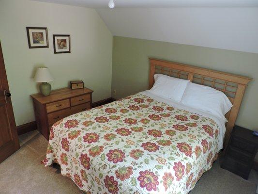 Bedroom #3 boasts a queen bed and is near the master bath