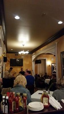 Dining area and live music space. Peep that moulding!