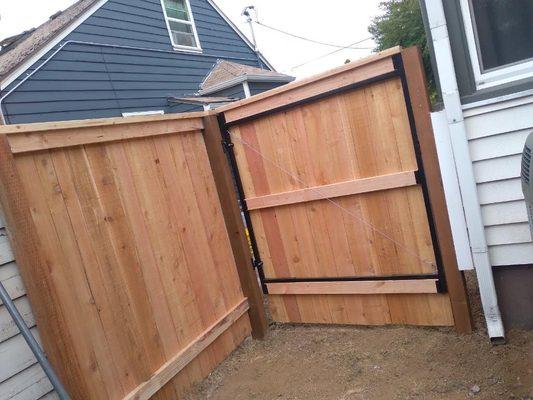 Metal frame gate with cedar boards