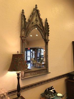 Beautiful mirror in the lobby. }:{