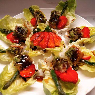 Butter Lettuce filled with Pesto Croutons, Asparagus Tips, Strawberries & Balsamic Syrup.