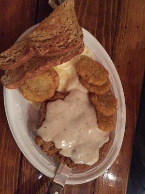 Chicken fry with eggs, potatoes, and toast.  $10.