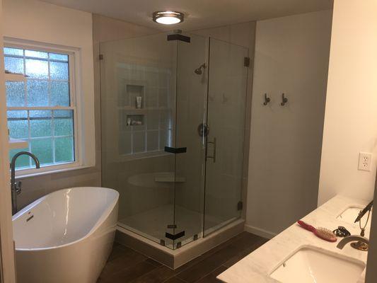 New bathroom with new shower and free standing tub