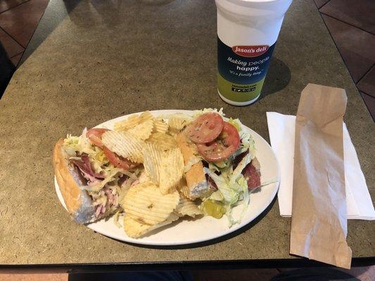 Italian Po-Boy sandwich and chips.