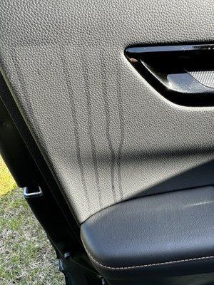 Stains from tint installation that they did not clean.