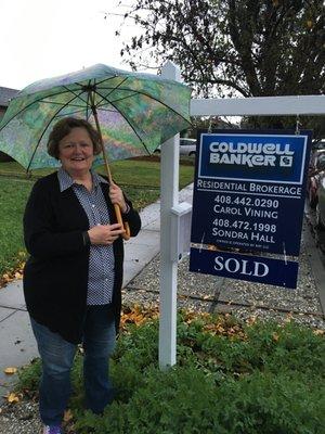 Another happy seller, even in the rain!