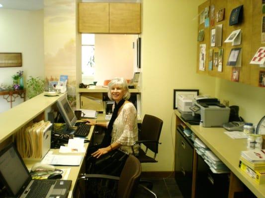 Brighid Desmond, Office Administrator working the front desk and ready to take your calls!