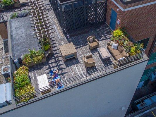 The communal rooftop deck, perfect for relaxing and enjoying the views of Lake Mendota and Lake Monona!